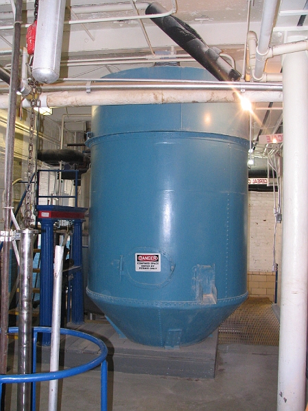 IMG_2257.jpg - The big blue container is still left from the original brewery.   To the left is the scale used to way the grains before they are added.