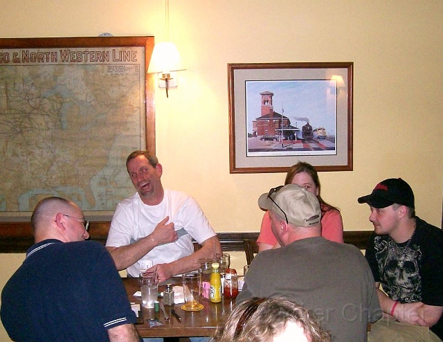 02.jpg - Rob Smits & Mark Krull (L) share a laugh with Al Wendt & his family.